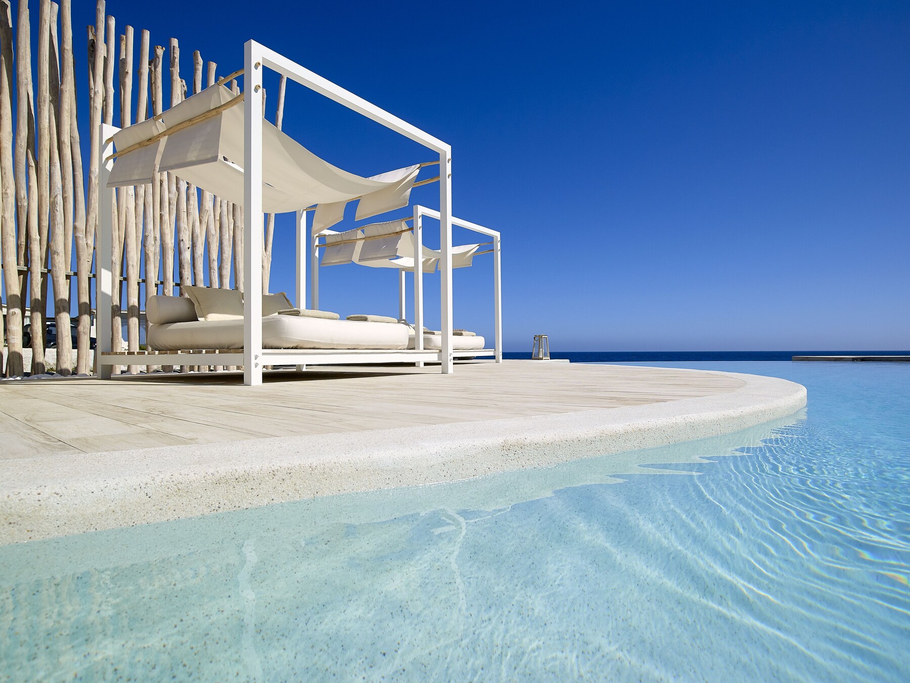Outdoor pool, free pool cabanas, pool umbrellas