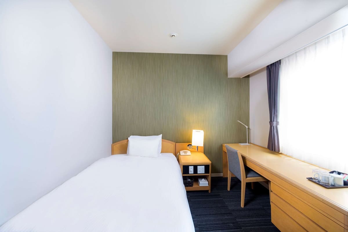 Pillowtop beds, blackout drapes, iron/ironing board, free WiFi