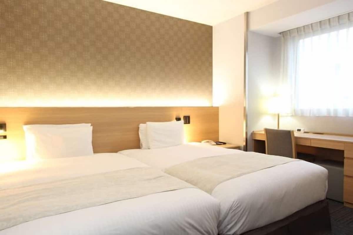 Pillowtop beds, blackout drapes, iron/ironing board, free WiFi