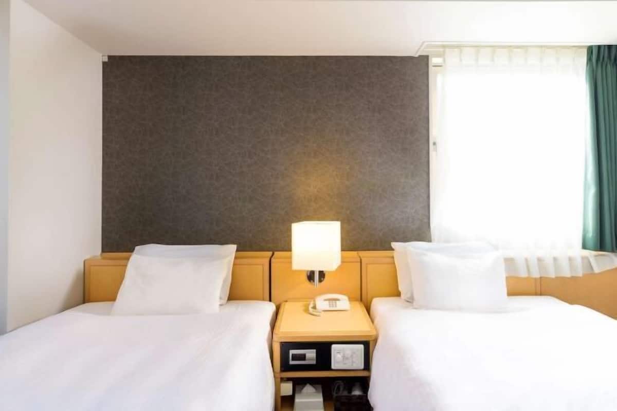Pillowtop beds, blackout drapes, iron/ironing board, free WiFi