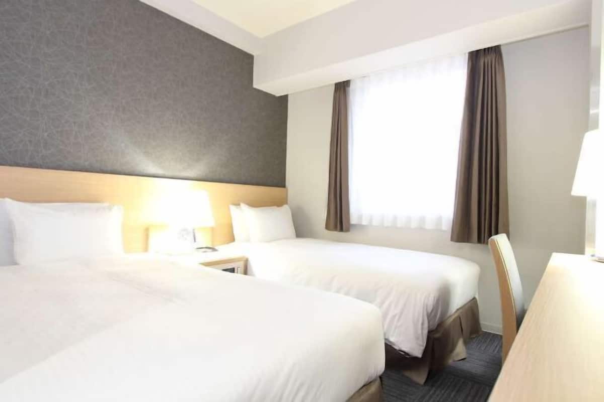Pillowtop beds, blackout drapes, iron/ironing board, free WiFi