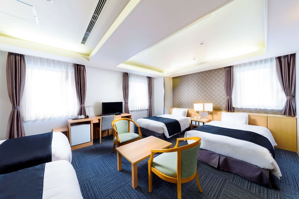 Family Room, Multiple Beds, Non Smoking | Pillowtop beds, blackout drapes, iron/ironing board, free WiFi