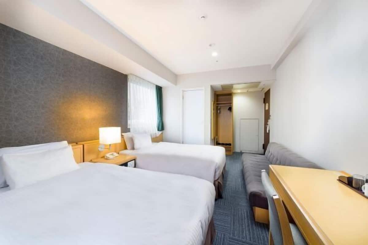 Pillowtop beds, blackout drapes, iron/ironing board, free WiFi