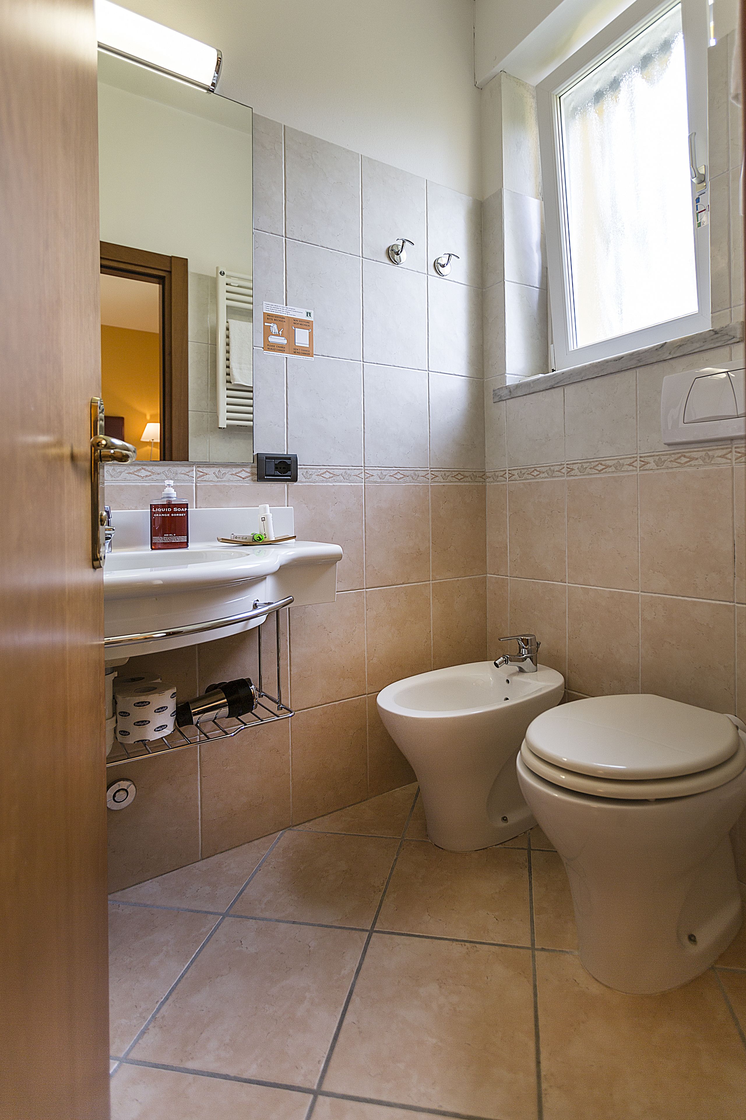 double room, garden view | bathroom | shower, rainfall showerhead, designer toiletries, hair dryer