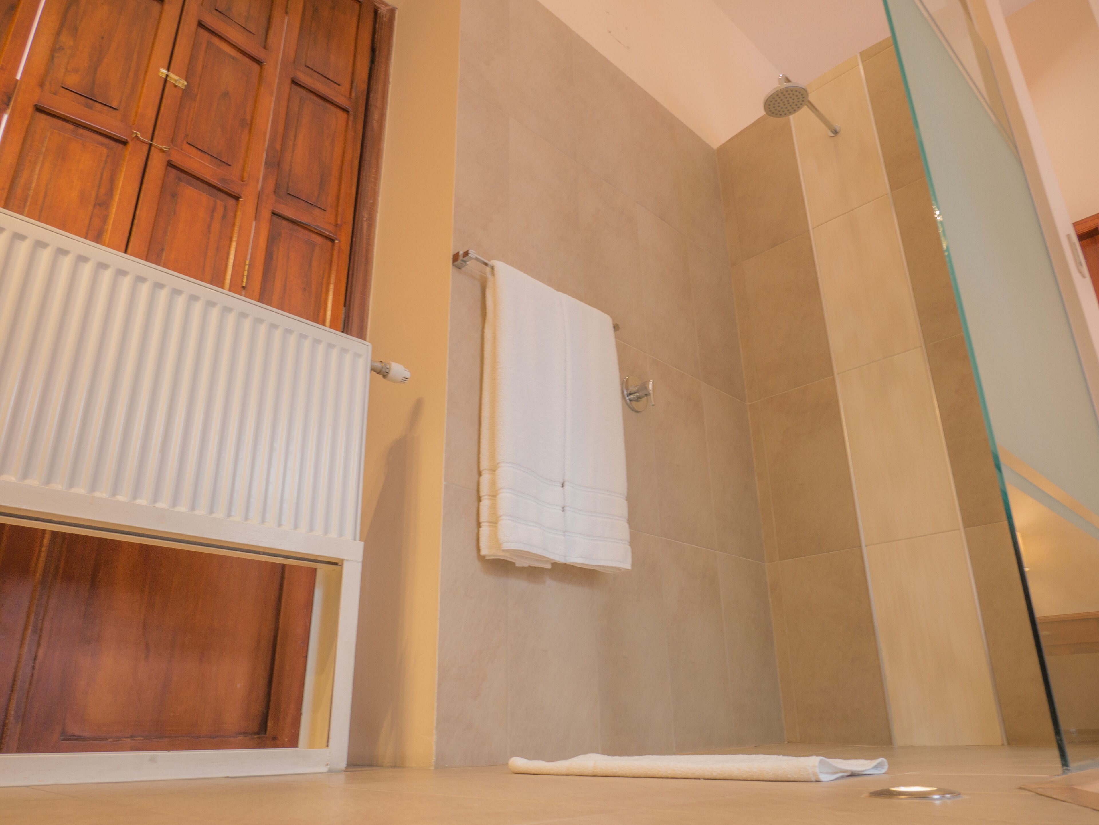 superior room | bathroom | shower, rainfall showerhead, free toiletries, hair dryer