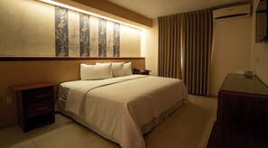 Enkeltrom – standard | Sengetøy av topp kvalitet, safe på rommet og strykejern/-brett