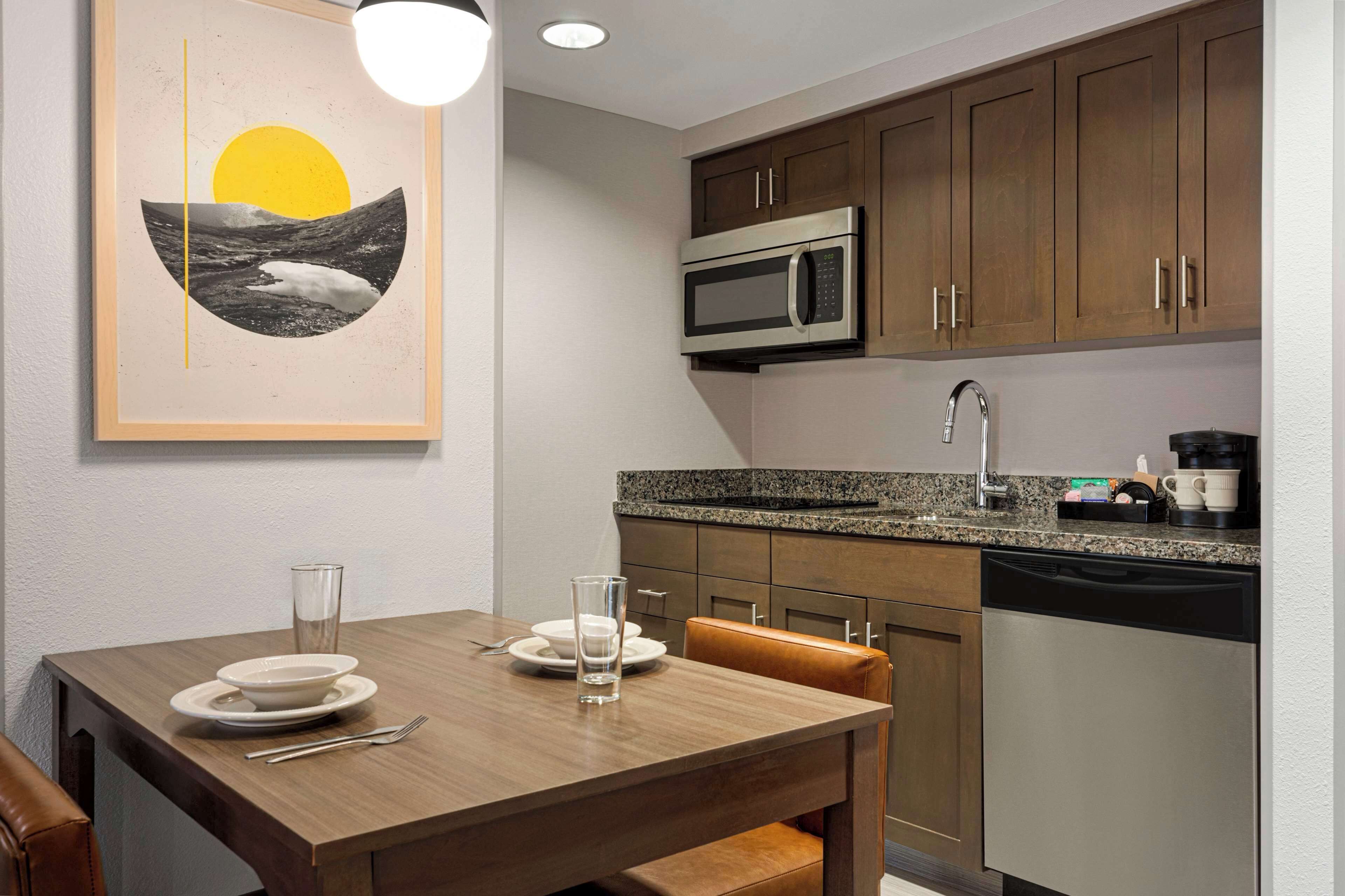 suite, 1 bedroom | private kitchen | full-sized fridge, microwave, stovetop, dishwasher