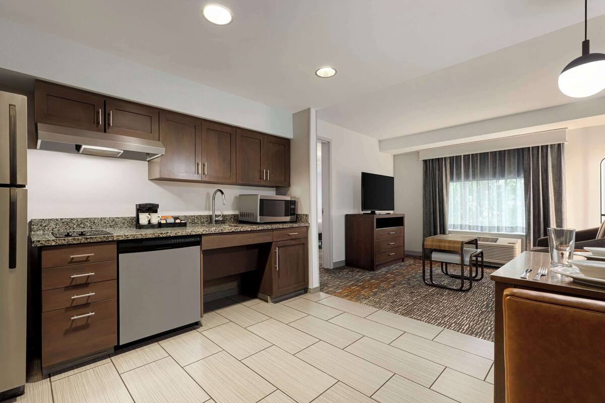 suite, 1 king bed with sofa bed | private kitchen | full-sized fridge, microwave, stovetop, dishwasher