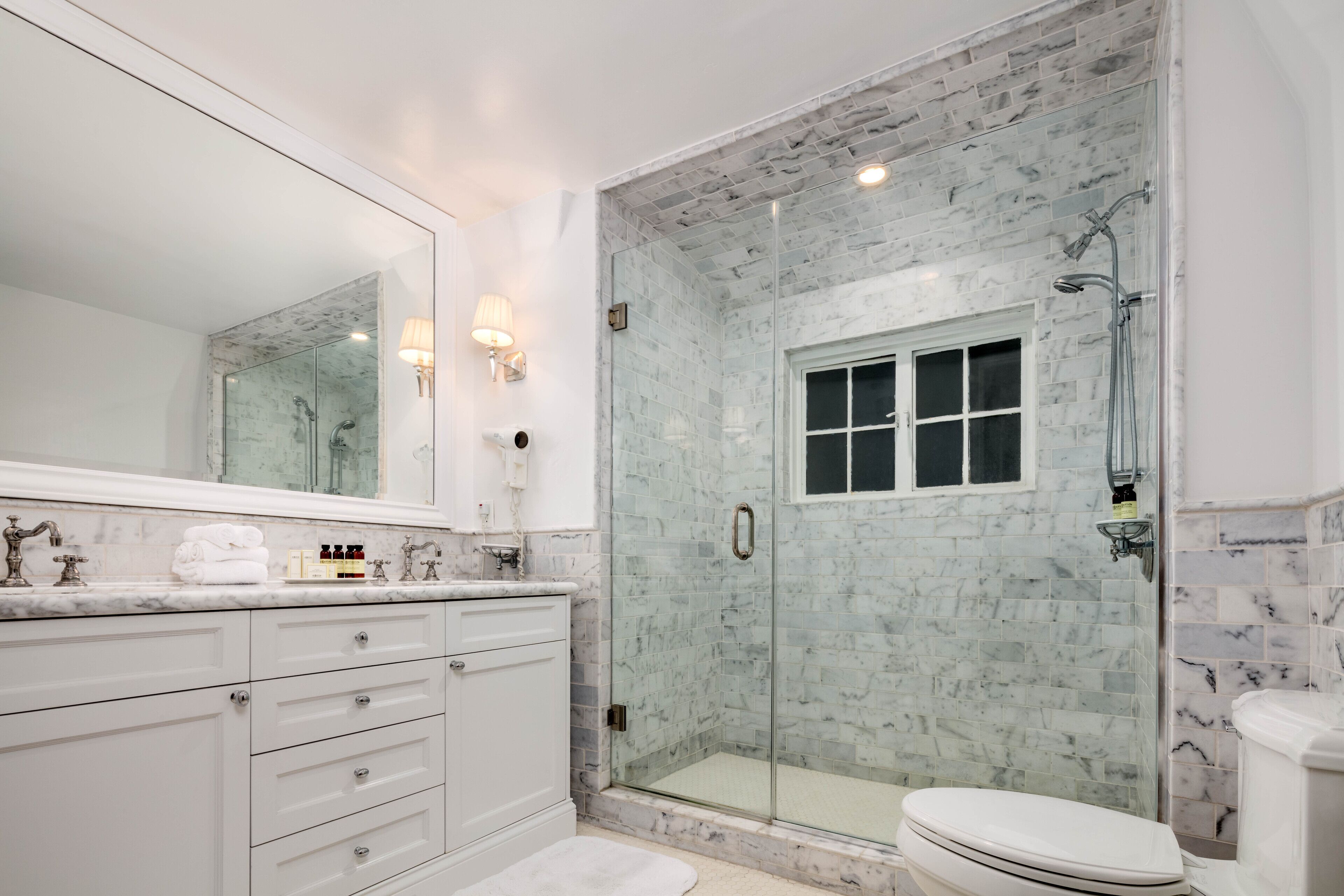 shower, designer toiletries, hair dryer, bathrobes