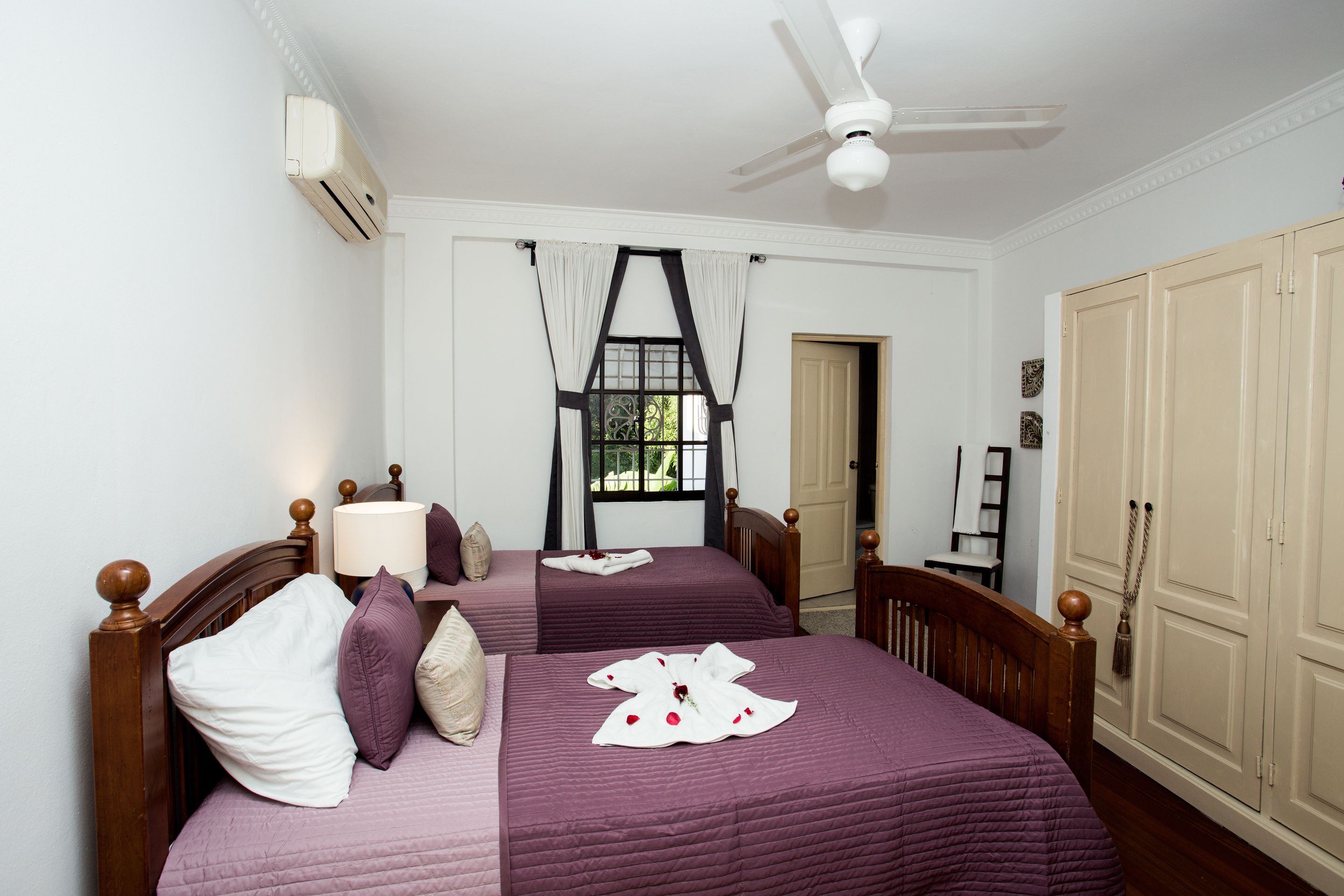 twin room | minibar, in-room safe, individually furnished, blackout curtains