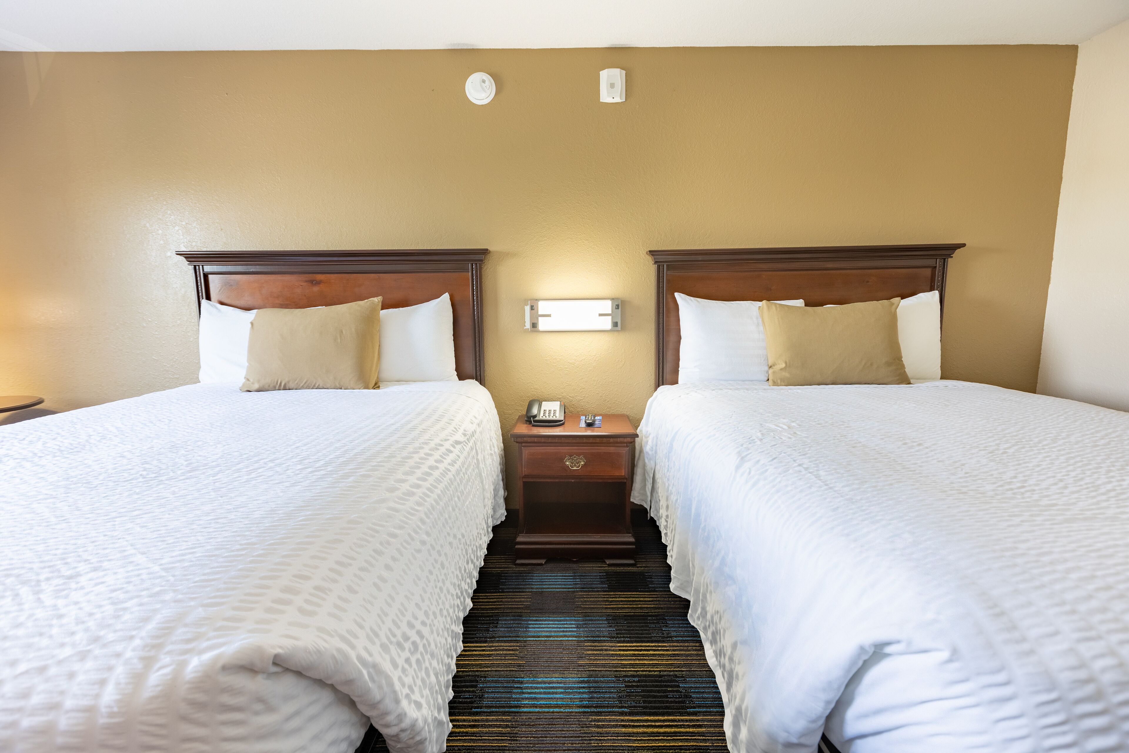 premium bedding, pillow-top beds, desk, iron/ironing board