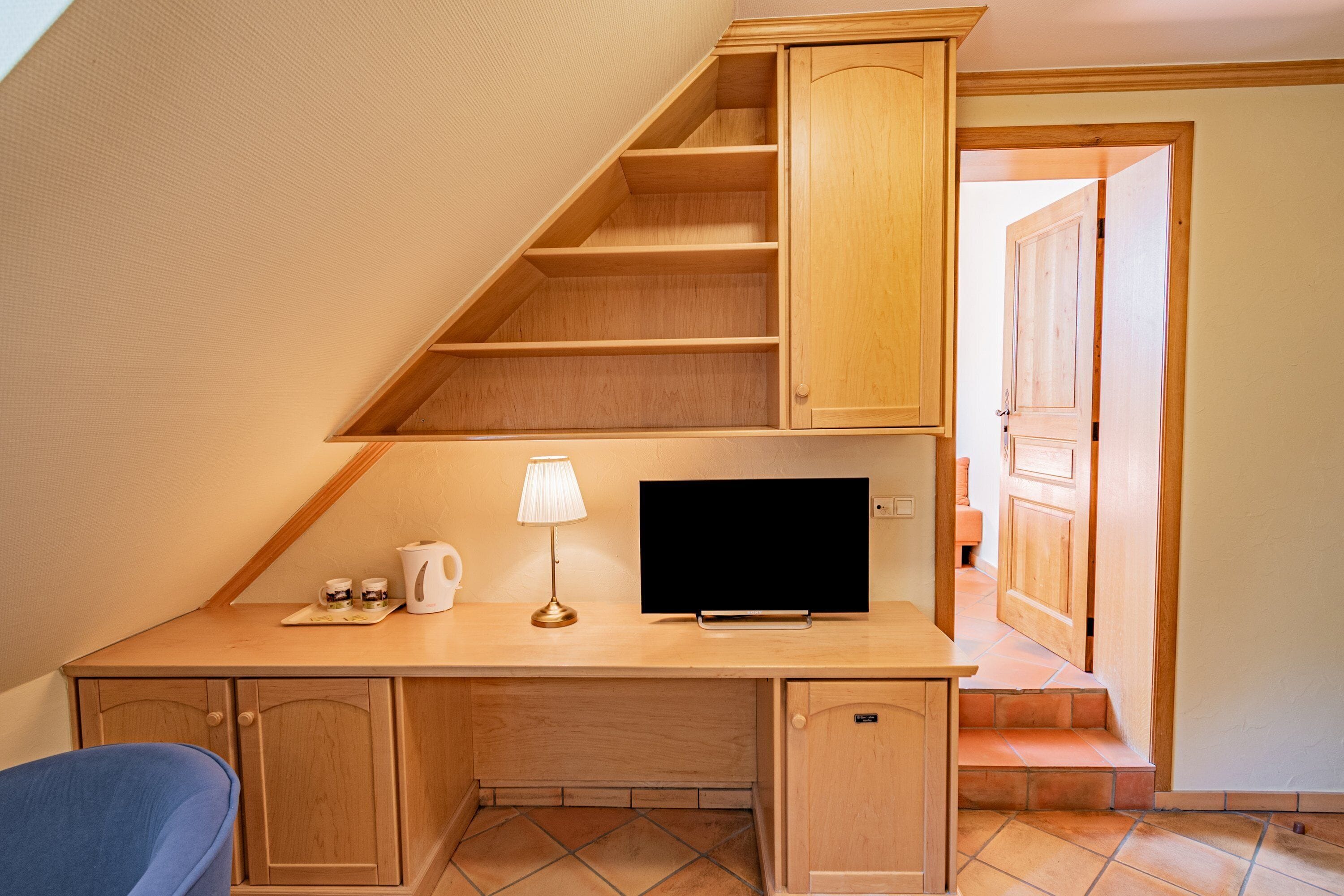 standard double room, 1 double bed | living area | tv