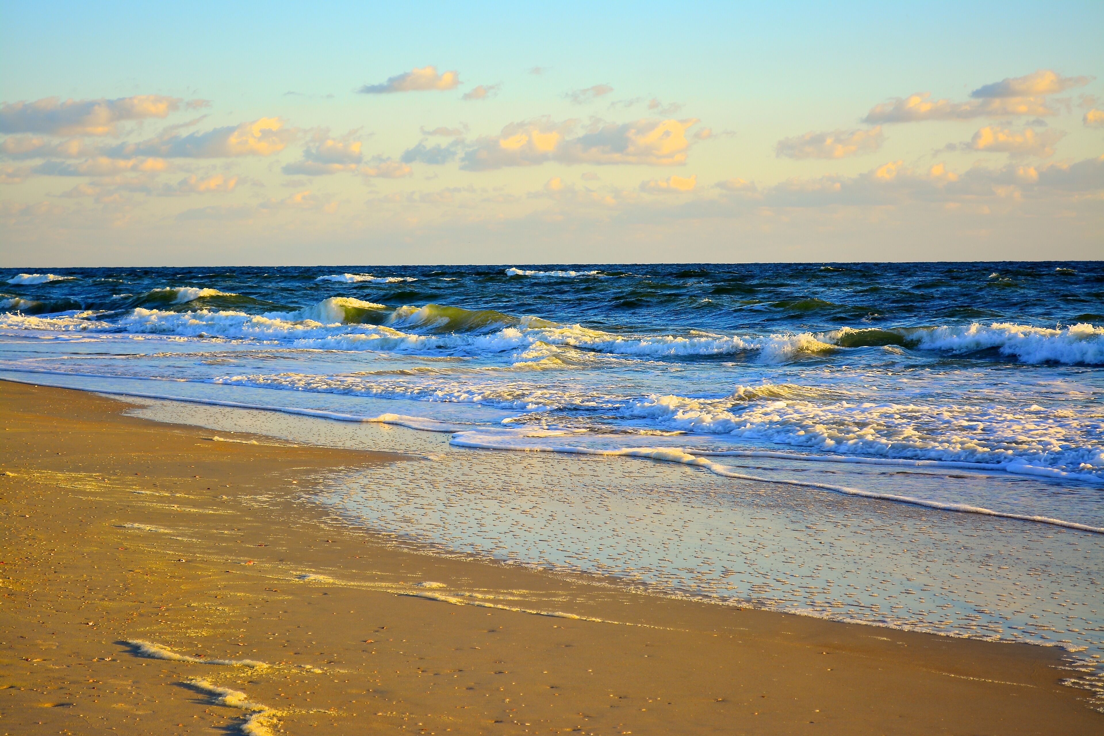 On the beach, sun loungers, beach umbrellas, beach towels