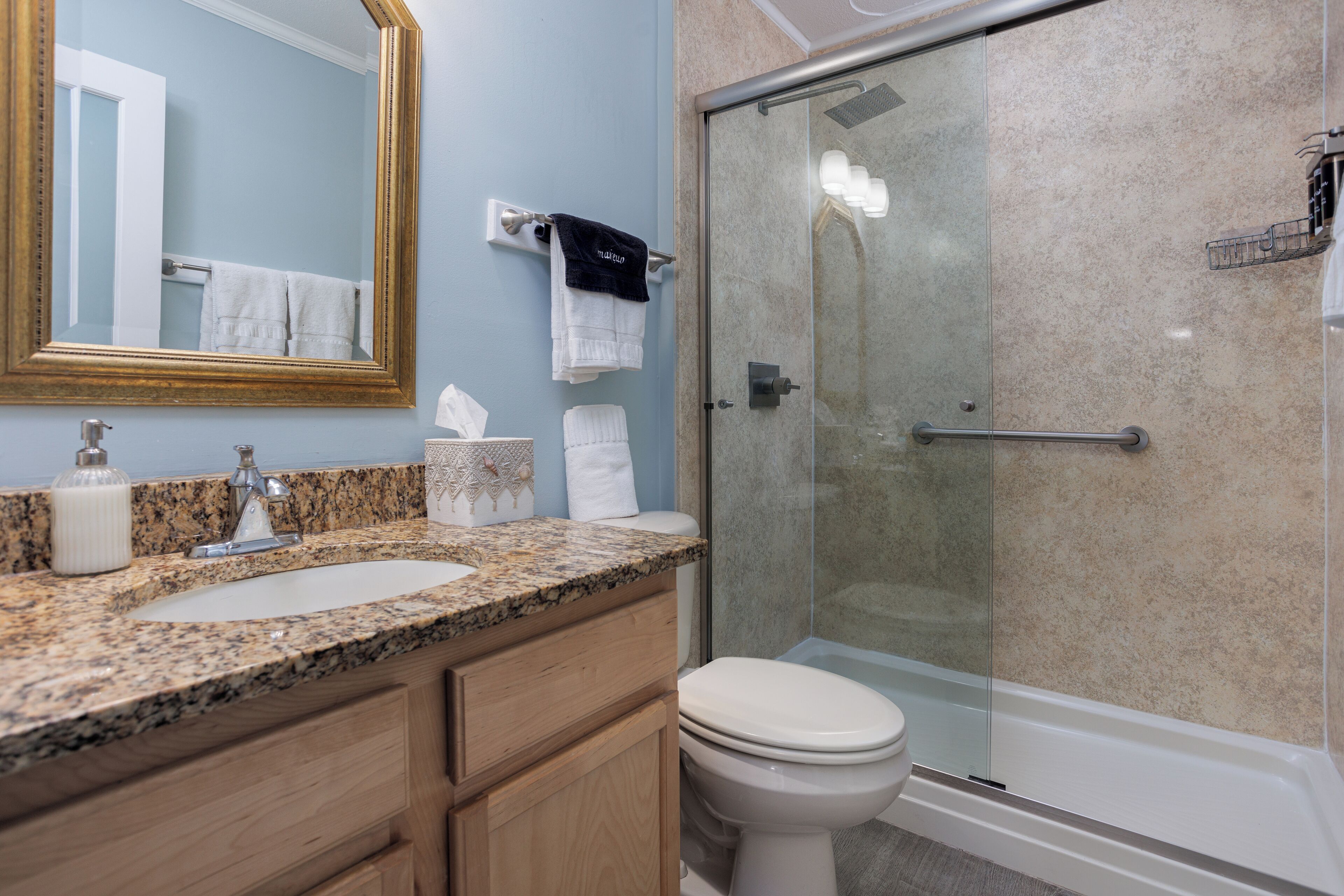 corner studio oceanfront king | bathroom | shower, rainfall showerhead, eco-friendly toiletries, hair dryer