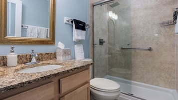 Corner Studio Oceanfront King | Bathroom | Shower, rainfall showerhead, eco-friendly toiletries, hair dryer