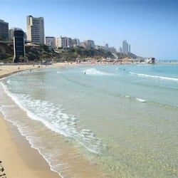 On the beach, sun loungers, beach towels
