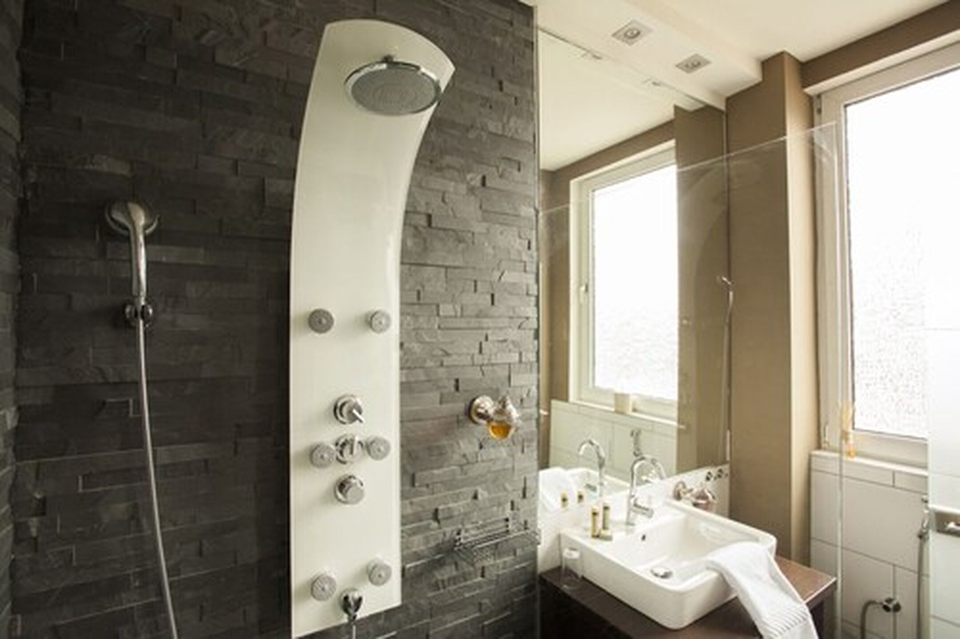 eco-friendly toiletries, hair dryer, towels