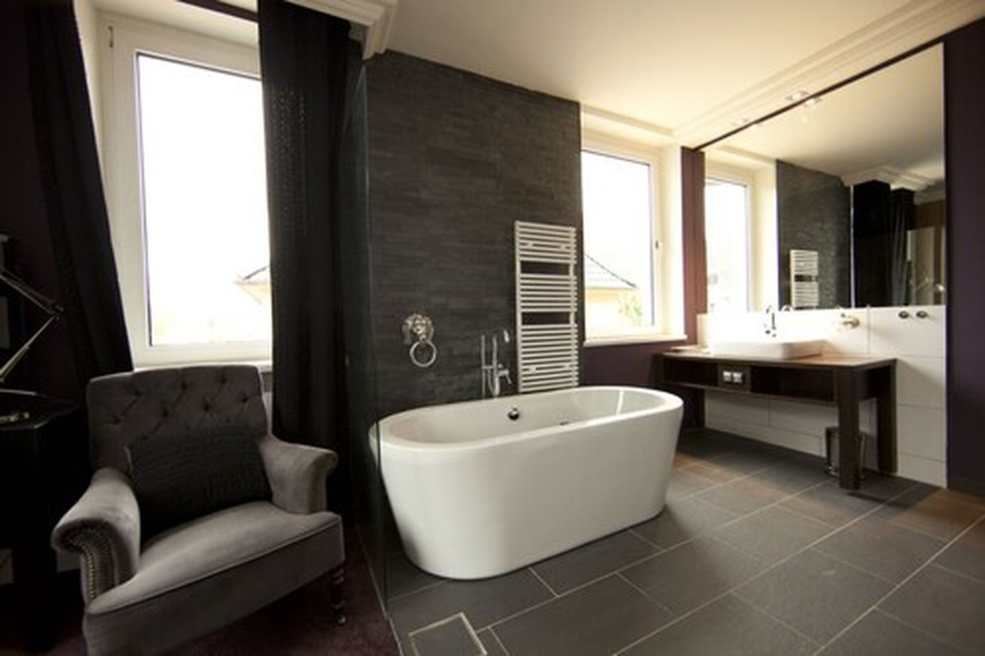 deluxe double room | bathroom | eco-friendly toiletries, hair dryer, towels