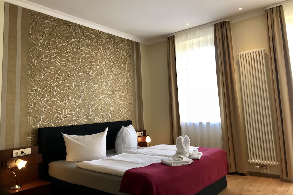 Deluxe tweepersoonskamer, balkon | Woonruimte | Een dvd-speler