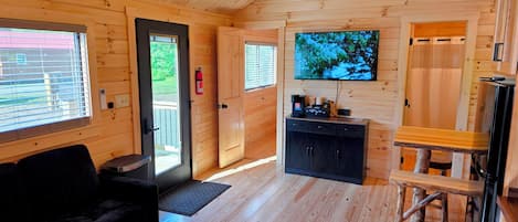Deluxe Cabin, 2 Bedrooms, Non Smoking | Living area | 50-inch Smart TV with digital channels, streaming services