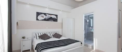 Down duvets, desk, blackout curtains, soundproofing