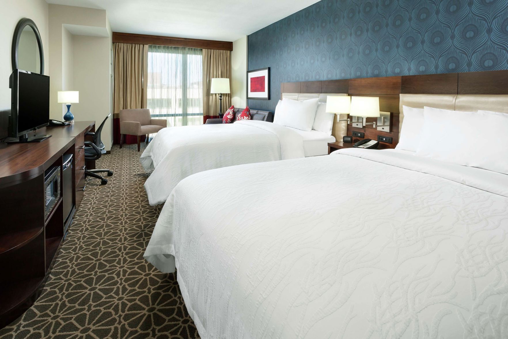 Premium bedding, down duvets, in-room safe, free cots/infant beds