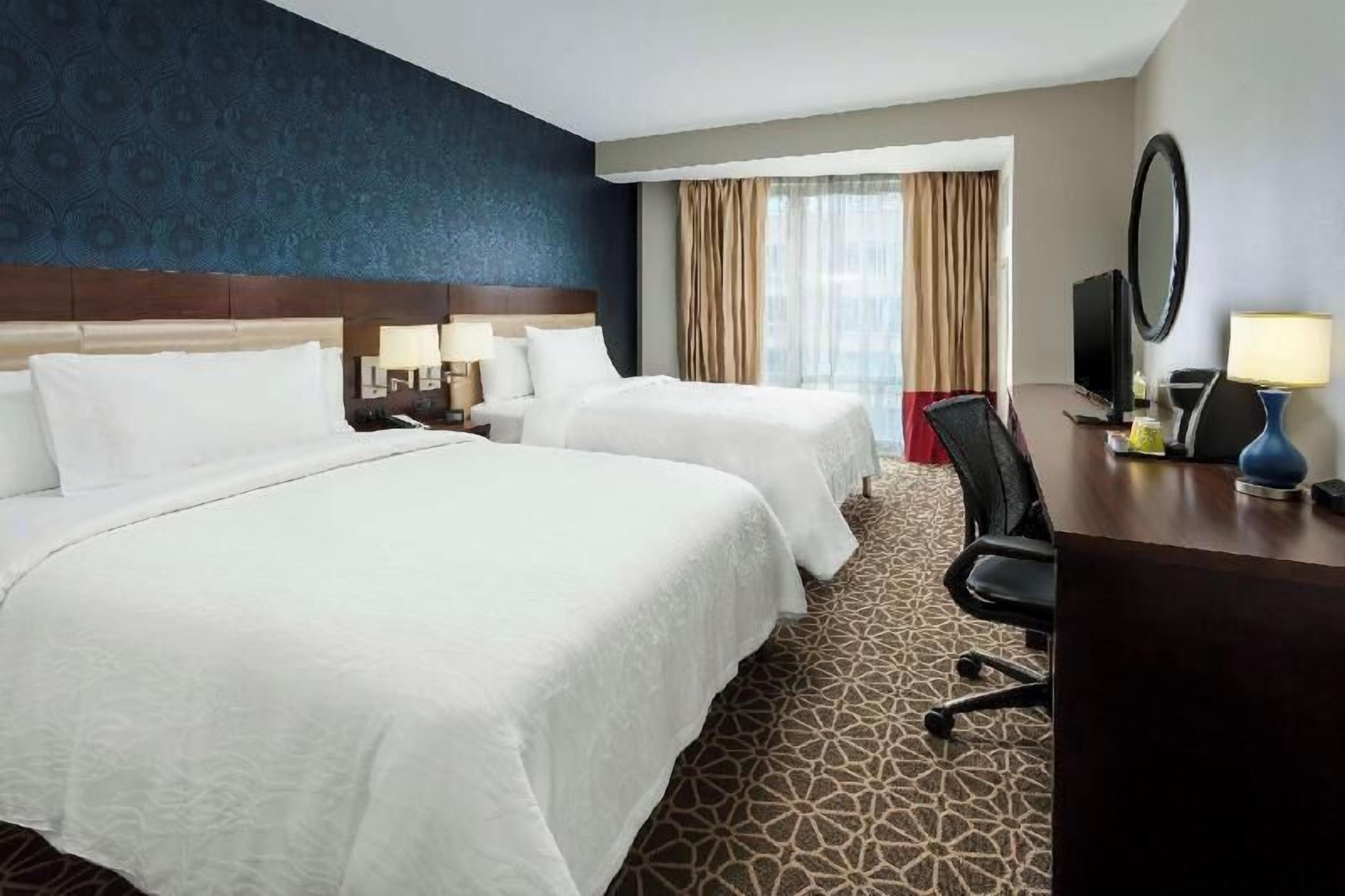 Premium bedding, down duvets, in-room safe, free cots/infant beds
