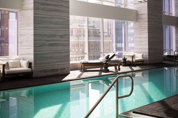 Indoor pool, open 6:00 AM to 9:00 PM, lifeguards on site