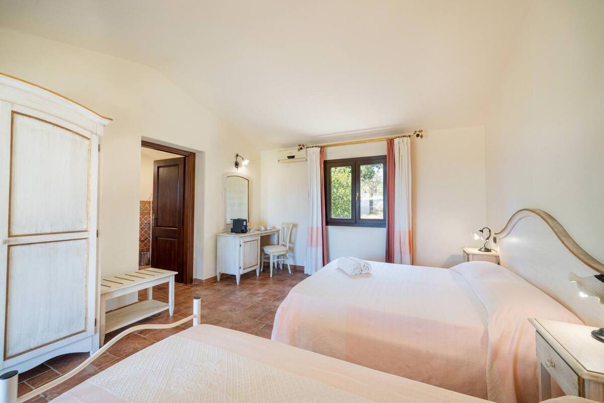 triple room, patio, garden view | desk, blackout curtains, soundproofing, iron/ironing board