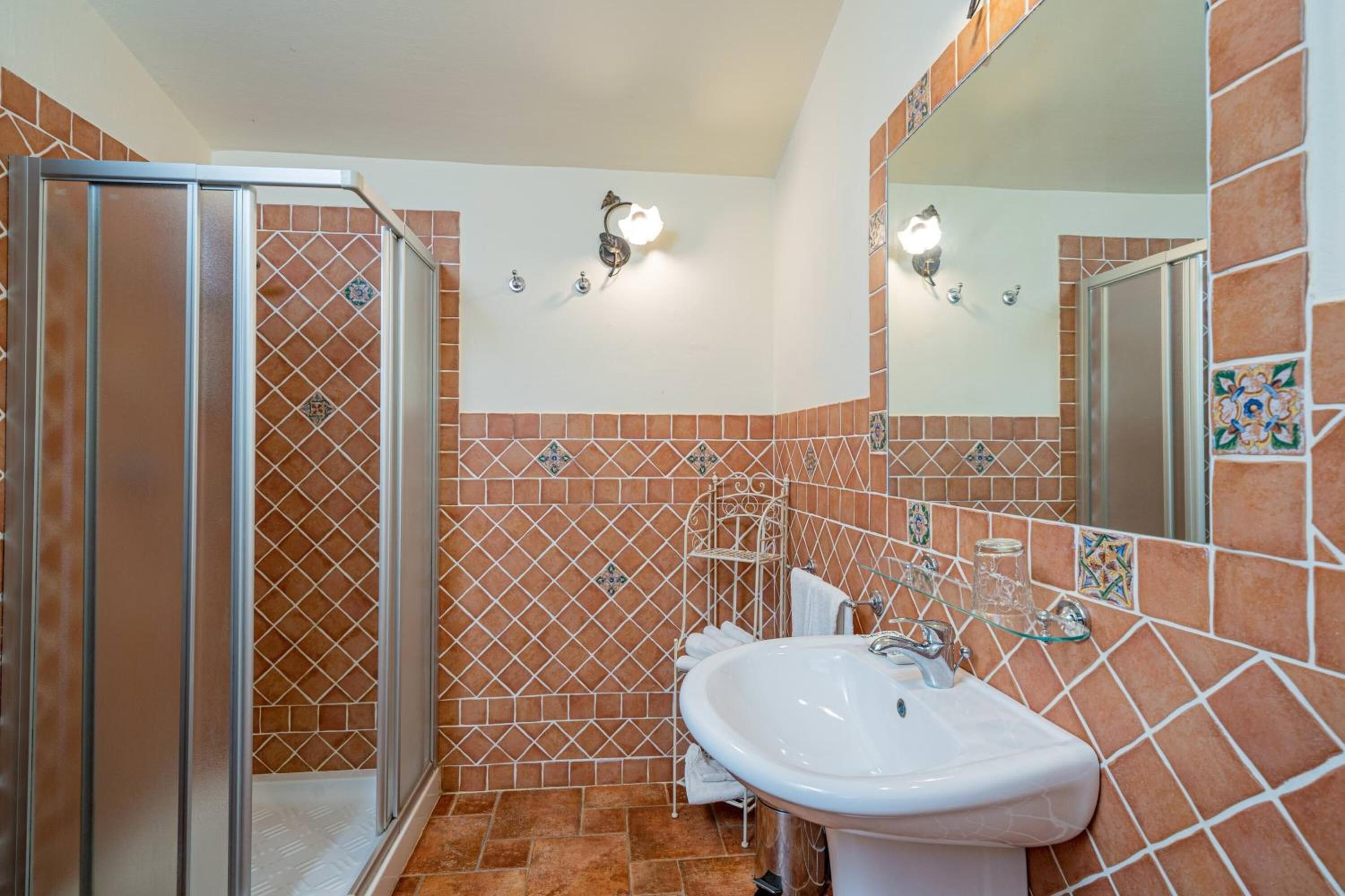 triple room, patio, garden view | bathroom | shower, free toiletries, hair dryer, bidet