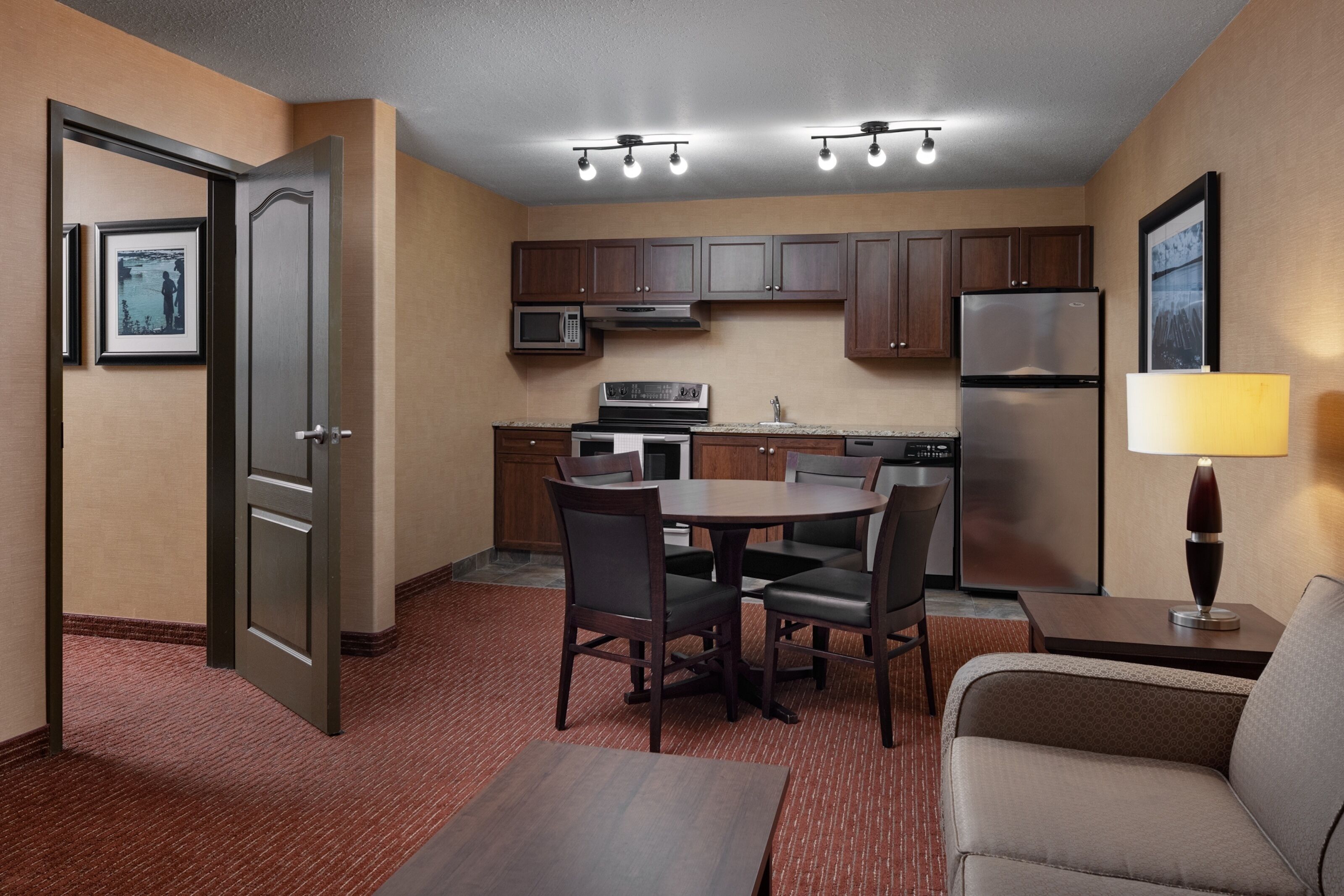 premium bedding, pillow-top beds, desk, laptop workspace