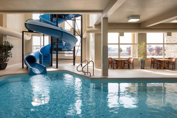 Indoor pool, open 8:00 AM to 8:00 PM, pool loungers