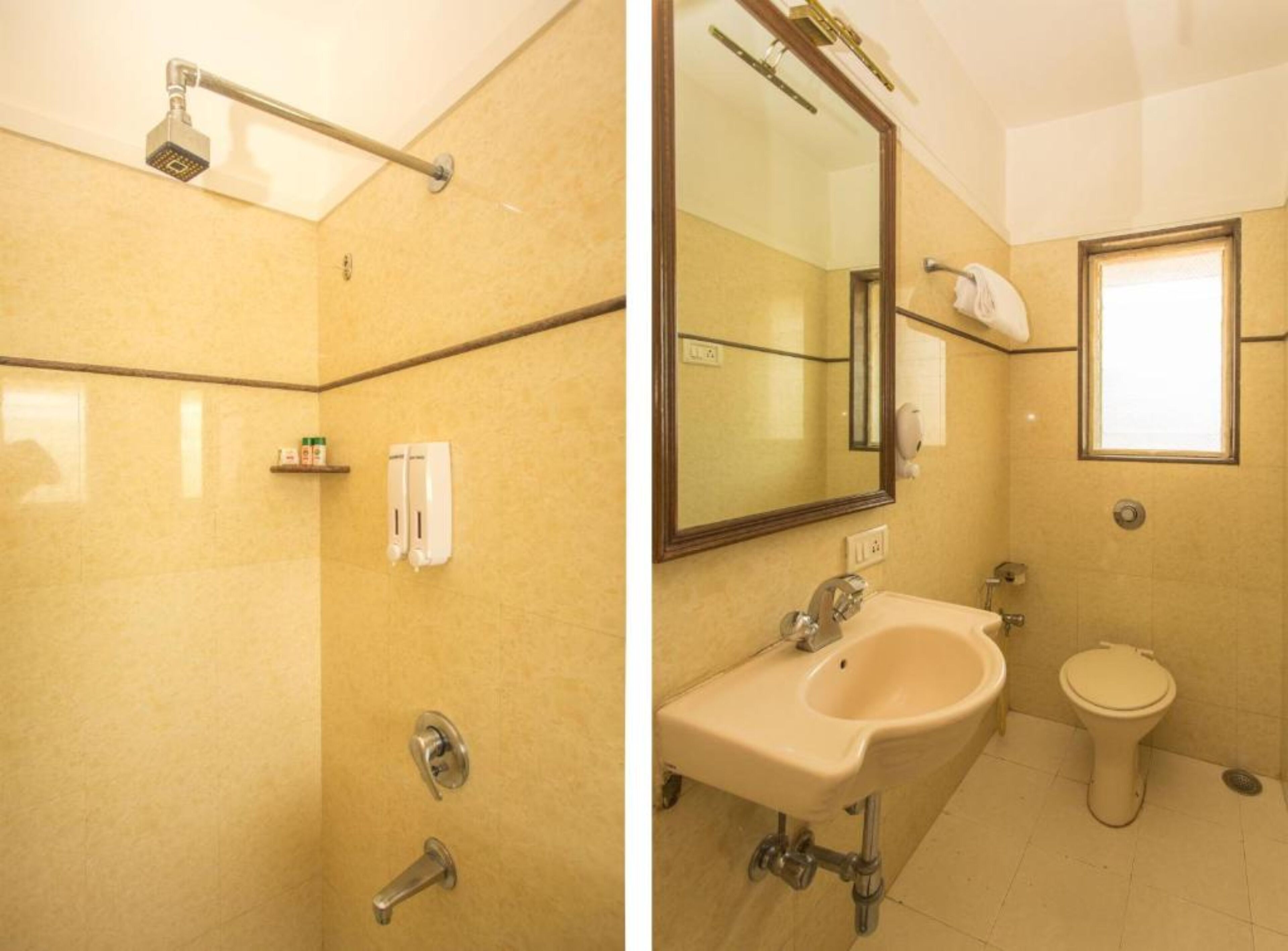 A bathroom with a shower, sink, and toilet.