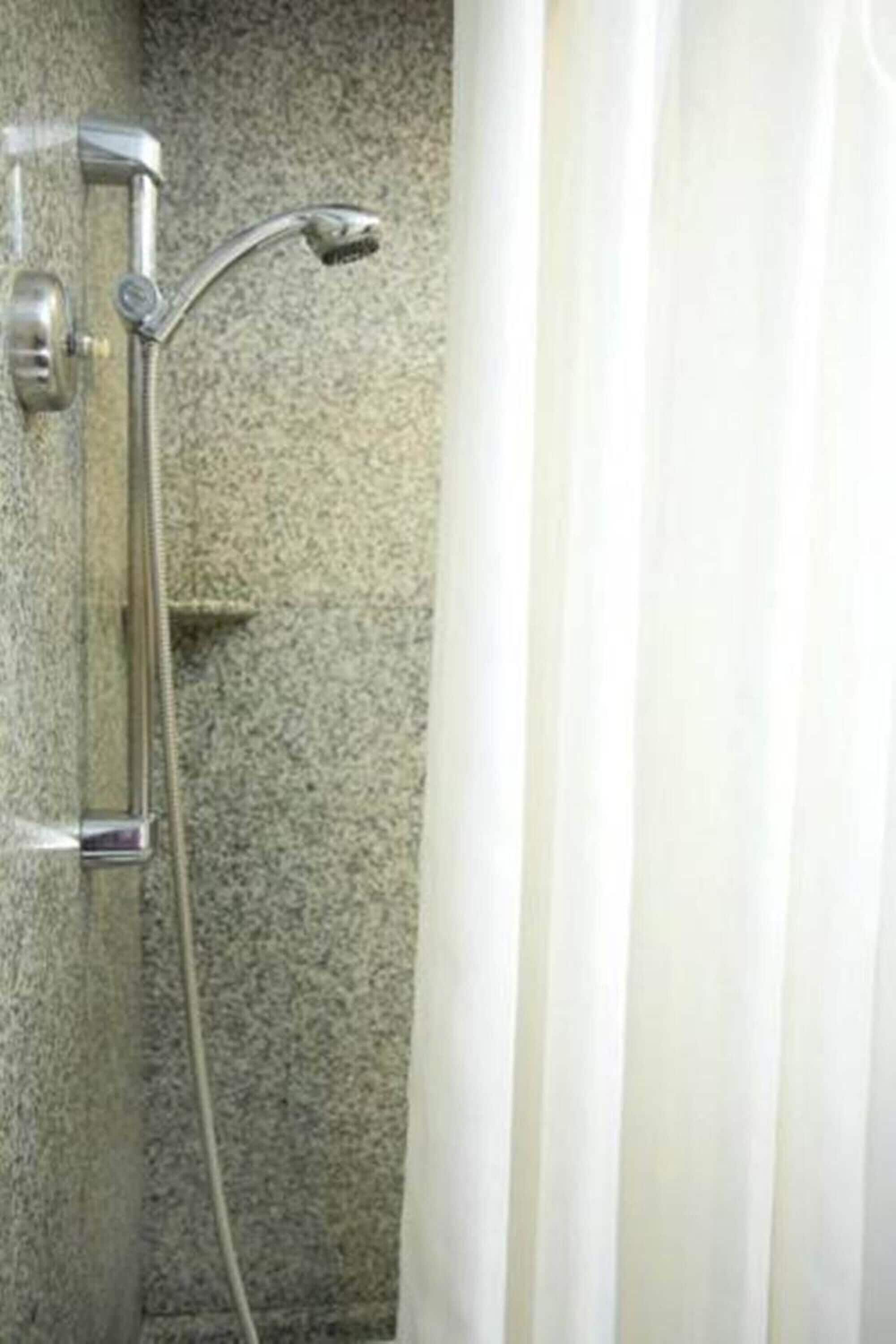 combined shower/bathtub, deep-soaking bathtub, rainfall showerhead