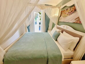 Suite Confort | Caja fuerte, sistema de insonorización, wifi gratis y ropa de cama