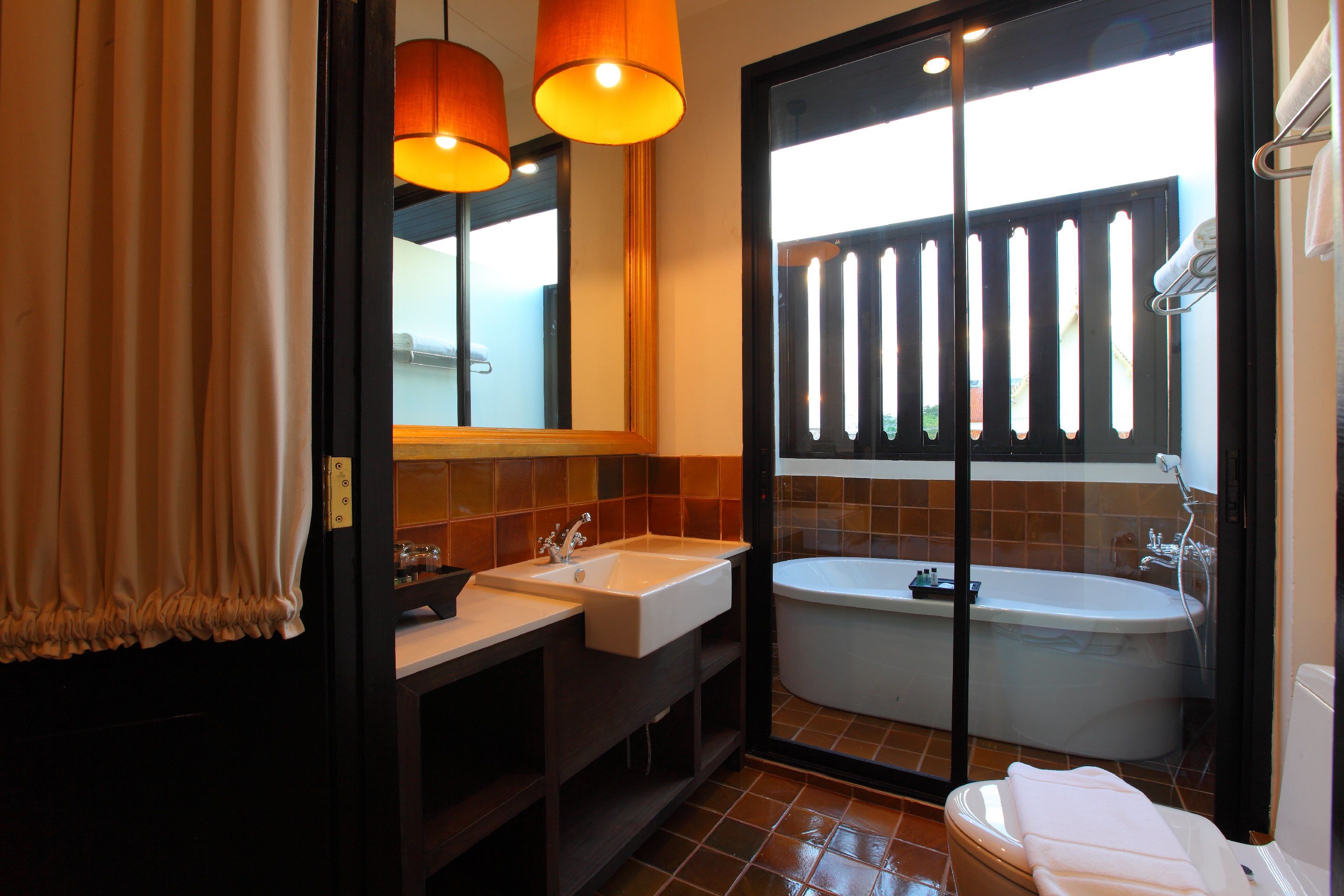 99 deluxe double | bathroom | shower, free toiletries, hair dryer, slippers