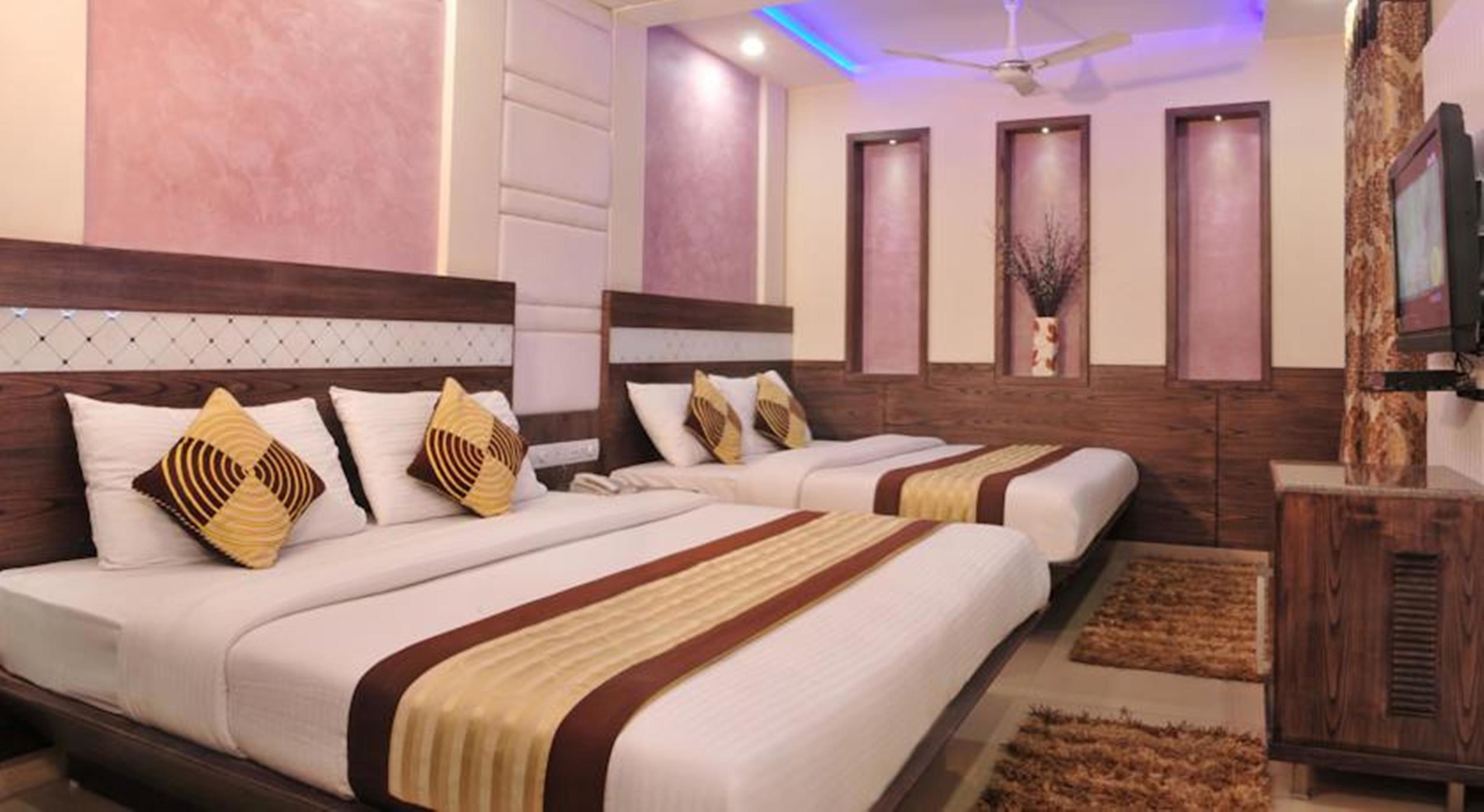 Family Double or Twin Room | Free minibar items, in-room safe, desk, iron/ironing board