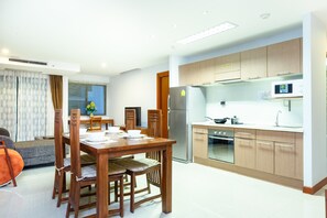 Three Bedroom Executive Residence | Private kitchen | Full-sized fridge, coffee/tea maker, electric kettle - Lasalle Suites Hotel & Residence (Bangkok)