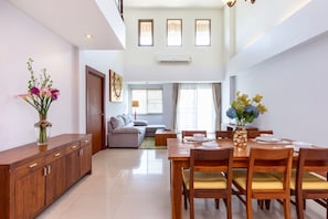 Five Bedroom Duplex Residence | Living area | 40-inch TV with cable channels, streaming services