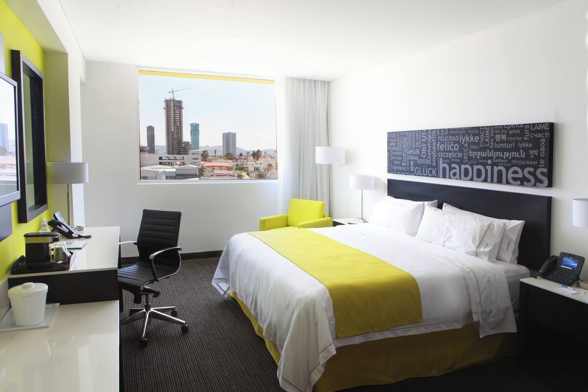 Suite, 1 King Bed | In-room safe, desk, blackout drapes, iron/ironing board