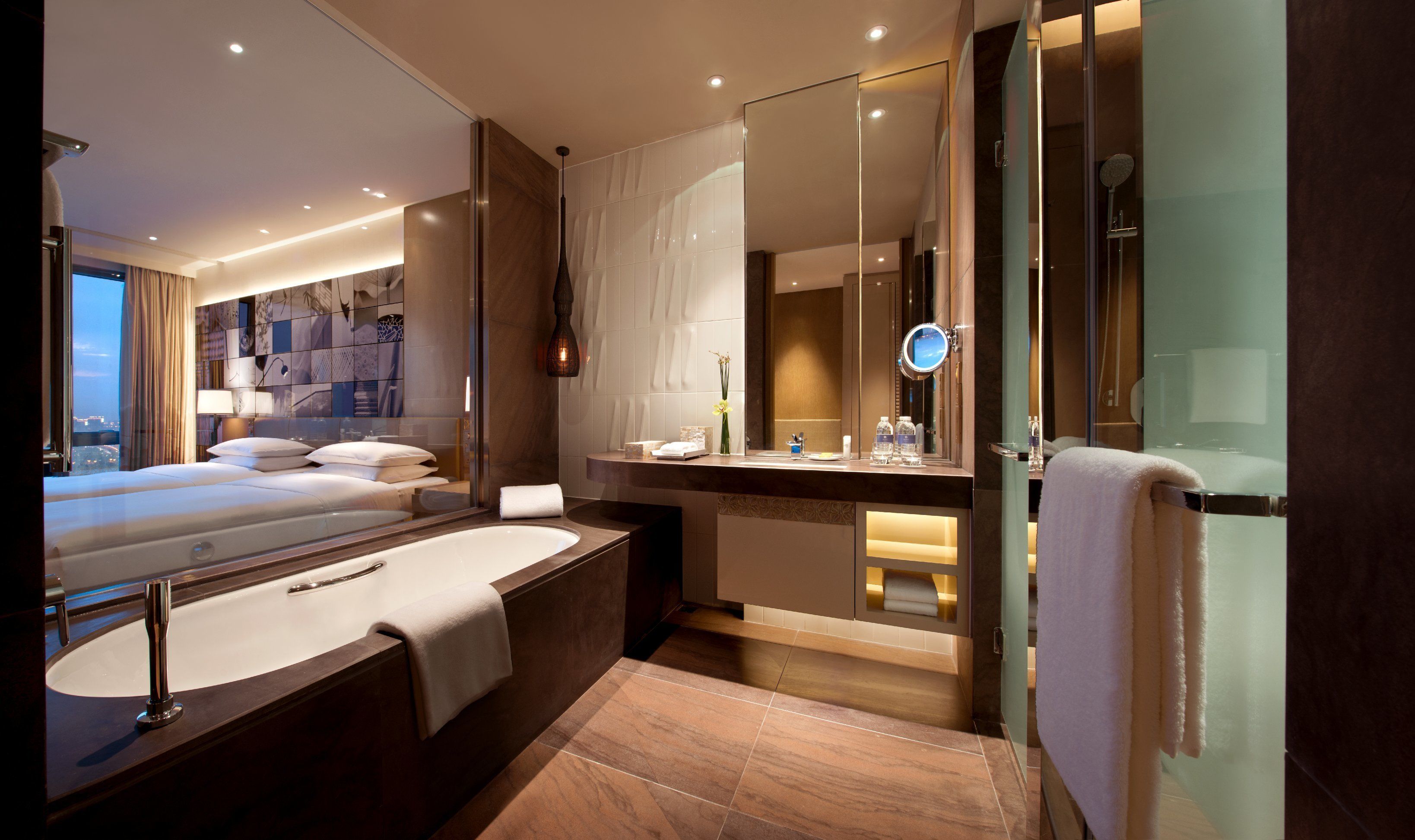 separate bathtub and shower, designer toiletries, hair dryer, bathrobes