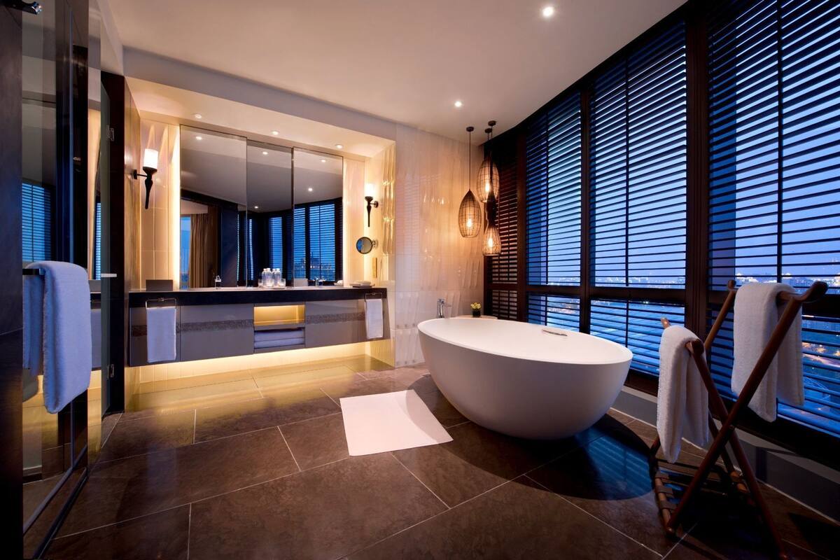 Bathroom | Separate tub and shower, designer toiletries, hair dryer, bathrobes