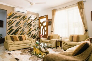 Premier Suite, Multiple Beds, Ensuite, Garden View | Living area | 40-inch LCD TV with satellite channels, TV