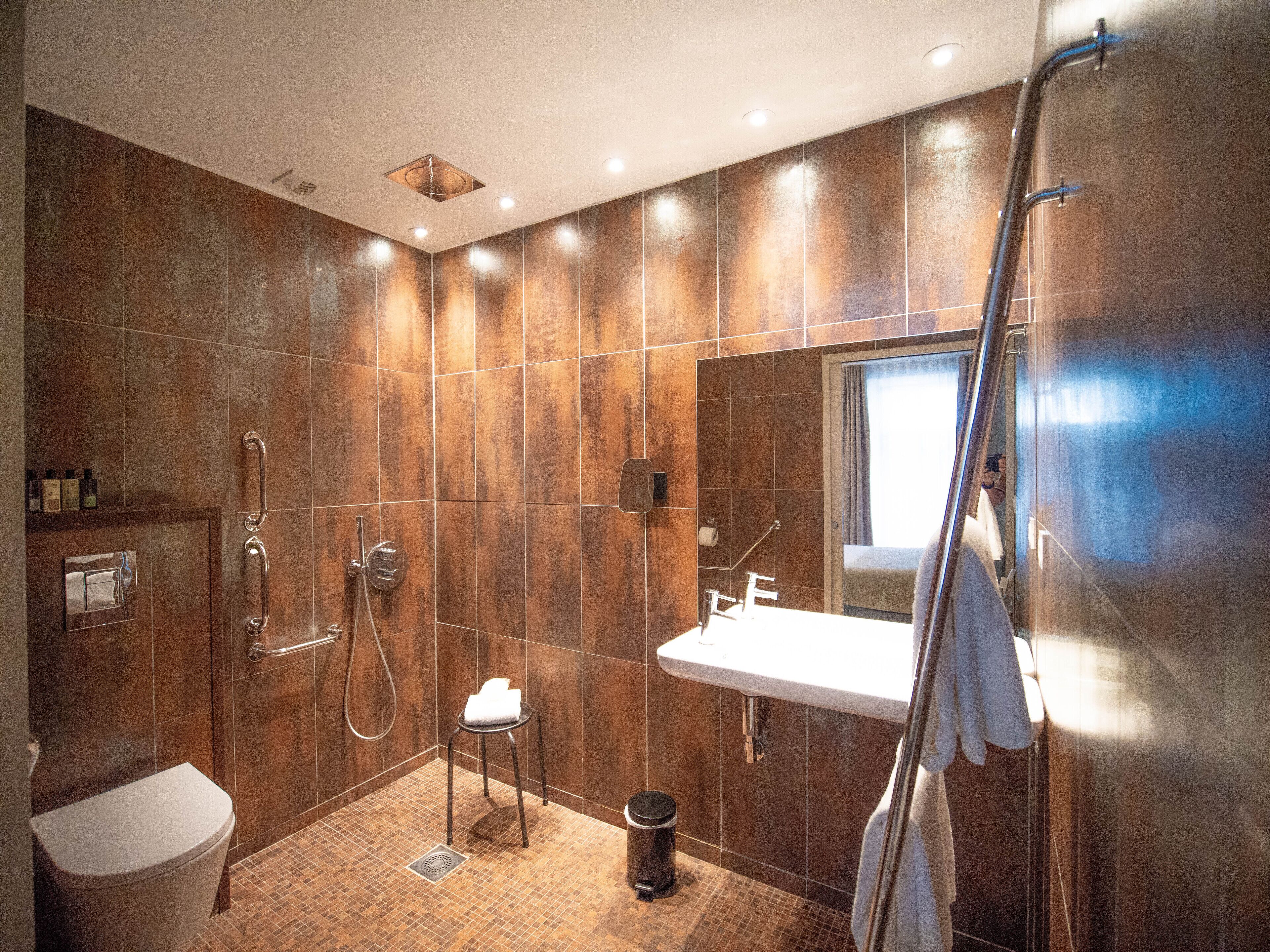 premium double room | bathroom | designer toiletries, hair dryer, bathrobes, slippers