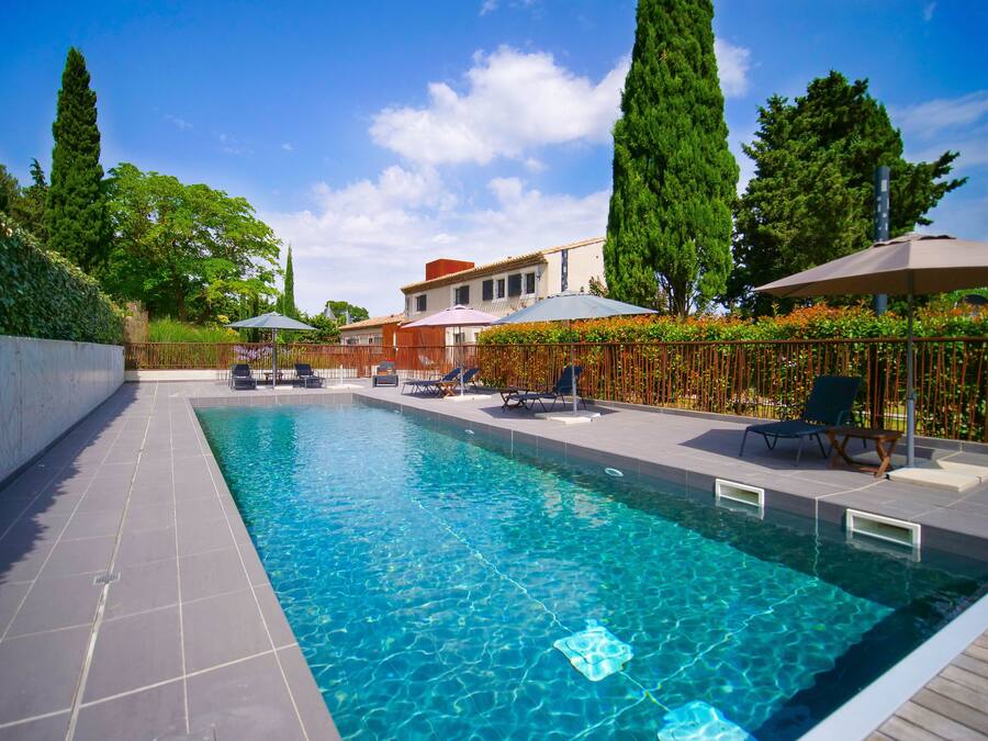 Outdoor pool, pool umbrellas, pool loungers