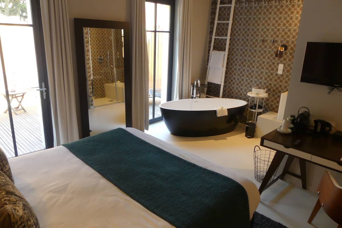 superior room (jacuzzi) | premium bedding, in-room safe, individually decorated, blackout curtains