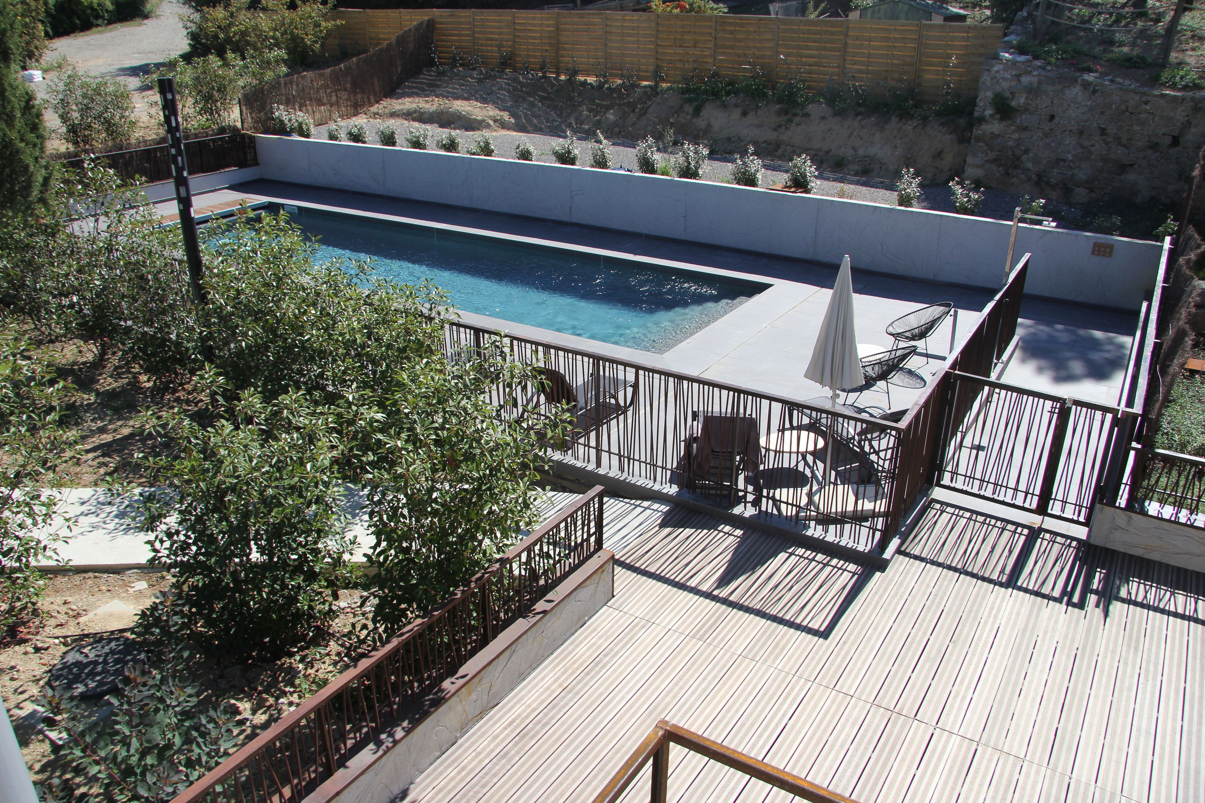 outdoor pool, pool umbrellas, pool loungers