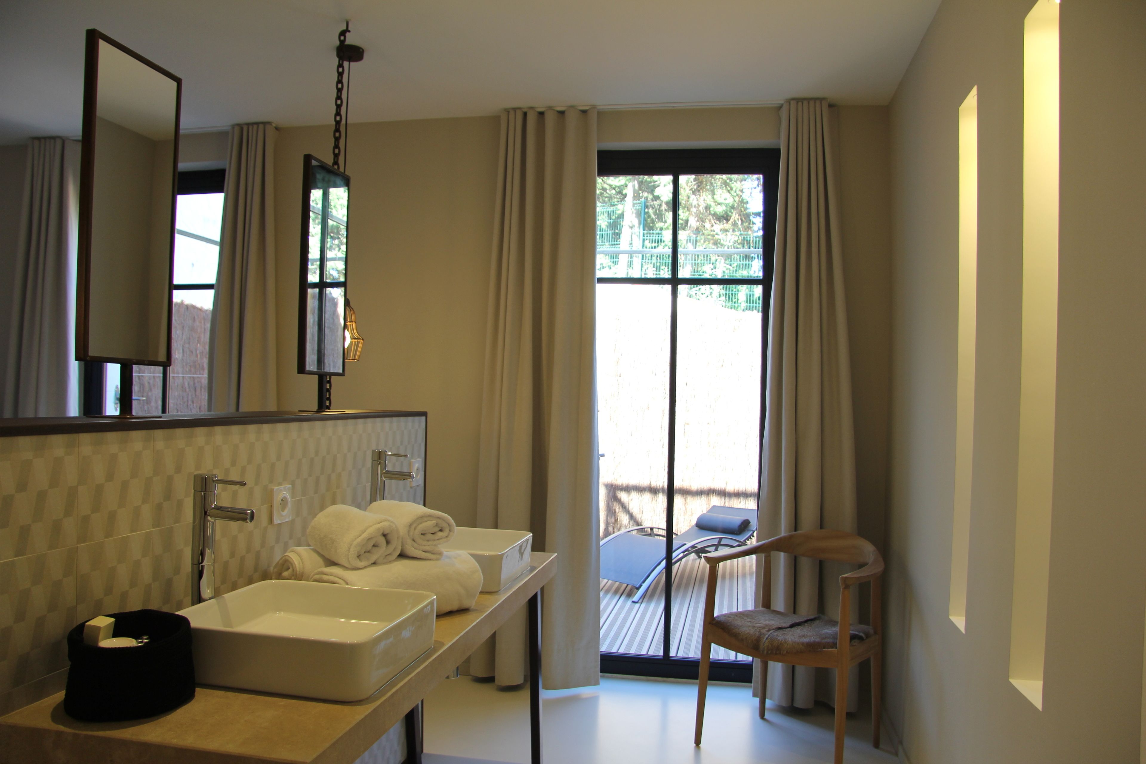 deluxe double room | bathroom | designer toiletries, hair dryer, bathrobes, slippers