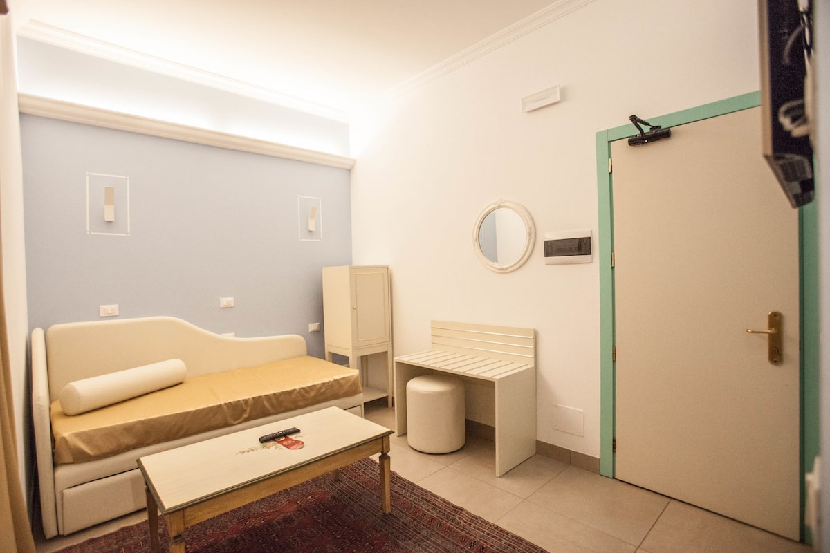 Triple Room | Minibar, in-room safe, desk, soundproofing