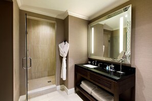 Shower, designer toiletries, hair dryer, bathrobes